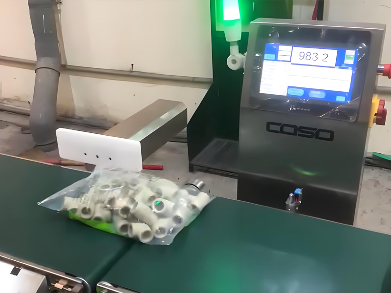 Checkweigher für Kunststoffkomponenten